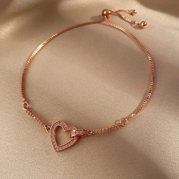 The Rose Gold Heart Chakra Slide Closure bracelet with heart pendant. - Picture 5 of 9